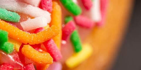 Ultra macro photo of a doughnut with sprinkles