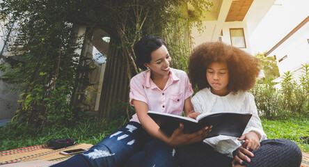 mom and daughter staying at home, Social Distancing and Self-Isolation, stay home quarantine, families self-isolating together for Novel Coronavirus COVID-19.