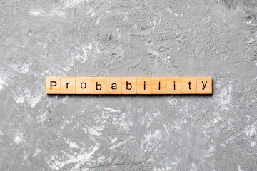 probability word written on wood block. probability text on table, concept