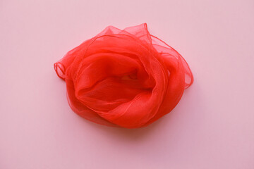 woman red scarf, symbol of vulva, clitoris, vagina, erotic minimal concept, top view, flat lay