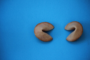 Fortune cookies, typical Chinese food, with blue background