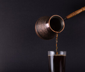 Freshly Brewed Turkish Coffee Poured from Cezve..