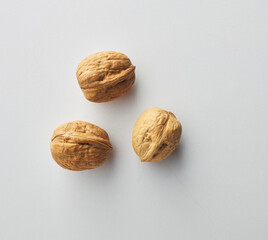 top view shot of walnut on white background.