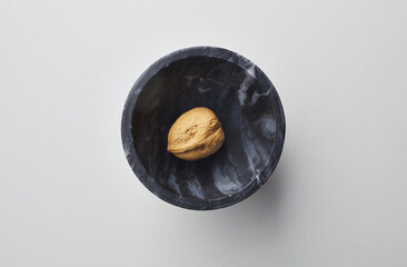 top view shot of walnut on white background.