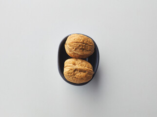 top view shot of walnut on white background.