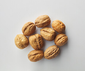 top view shot of walnut on white background.