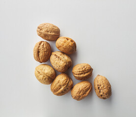 top view shot of walnut on white background.