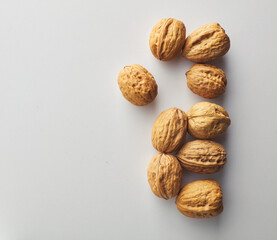 top view shot of walnut on white background.