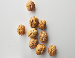 top view shot of walnut on white background.