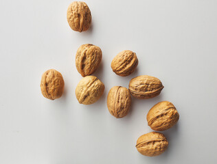 top view shot of walnut on white background.