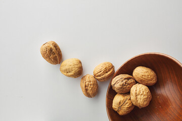top view shot of walnut on white background.