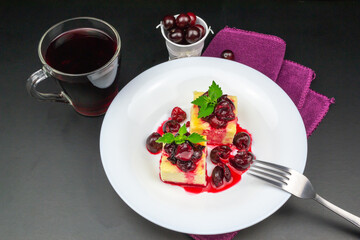Cottage cheese casserole decorated with cherries