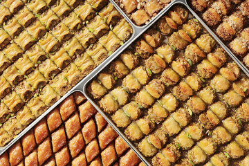 Traditional Dessert Turkish Baklava. Walnut, Pistachio Turkish Style Antep Baklava Presentation. Baklava from Turkish cuisine.