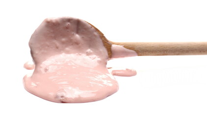 Strawberry fruit yogurt with wooden spoon isolated on white background