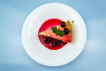 Cottage cheese casserole decorated with cherries