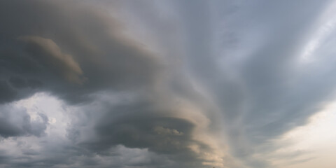 Fototapeta premium panorama of black sky background with storm clouds. thunder front