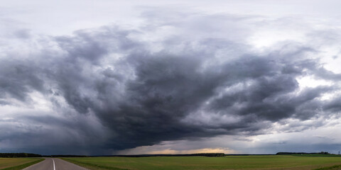 Fototapeta na wymiar panorama of black sky background with storm clouds. thunder front
