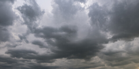 Obraz premium panorama of black sky background with storm clouds. thunder front