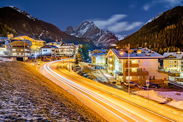 A night shot of city of Canazei. Its a comune (municipality) in Trentino in the northern Italian...