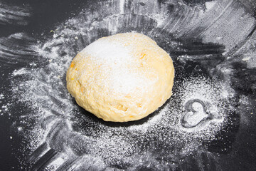 cute heart on the flour near dough