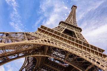 The Eiffel Tower is a wrought-iron lattice tower on the Champ de Mars in Paris, France. It is named after the engineer Gustave Eiffel, whose company designed and built the tower.