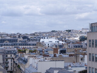 Fototapeta na wymiar A panoramic view of Paris from a nice terrace. (view from Paris 9th district)