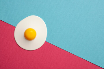 egg on blue and pink background
