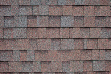 Roof tiles brown grey multicoloured close up texture