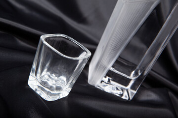 Empty glass on black background