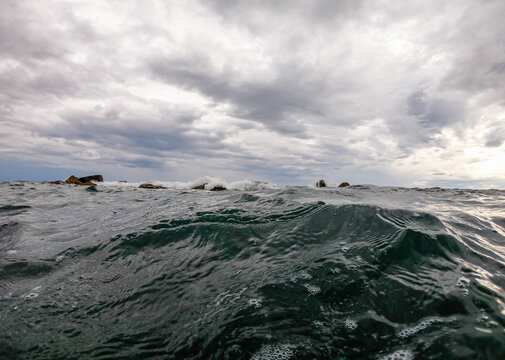 view of the ligurian coast. high sea waves