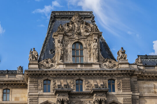 View of Colbert Pavilion in main courtyard (Cour Napoleon) of Louvre Museum in Paris. Louvre Museum is one of largest and most visited museums worldwide. PARIS, FRANCE. May 29, 2018.