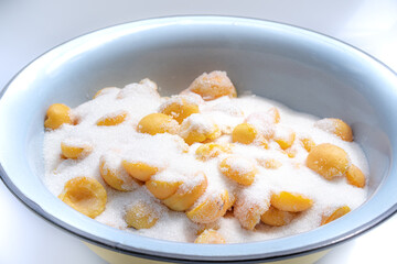 Cooking apricot jam. Apricots in sugar