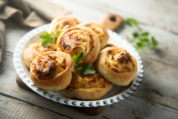 Homemade cheese buns with herbs