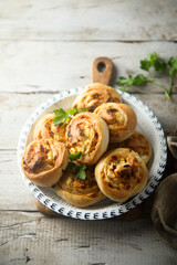 Homemade cheese buns with herbs