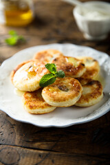 Homemade cottage cheese cakes with honey