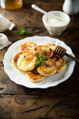 Homemade cottage cheese cakes with honey