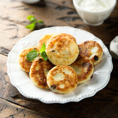 Homemade cottage cheese cakes with honey