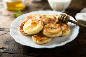 Homemade cottage cheese cakes with honey