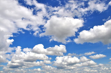 White clouds in a blue sky.