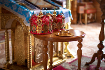 A man and woman marry through a Christian wedding ceremony