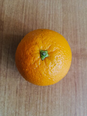 orange on wooden background