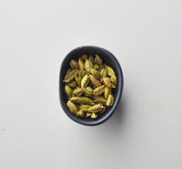 Top view shot of cardamom on white background.