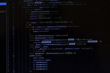 Obraz premium Program code CSS on black background. Computer screen close up. IT or freelance programmer concept. Software develop script on display. Computer Science