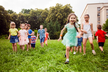 The children had an exciting race outdoors