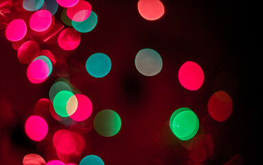 Christmas lights. Blurred background. Colored circles from the led lamp.