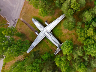 Abandoned old transport plane in the woods
