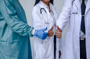 Close-up of doctor teamworking,Anesthesiologist,General Surgeon, General internists clasping...