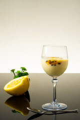 
passion fruit mousse served in a cup