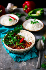 Chili con carne in ceramic bowl.style rustic