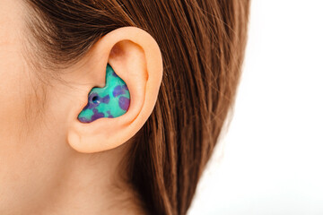 Personally molded earplugs for use in an airplane at high atmospheric pressure with pressure valve....